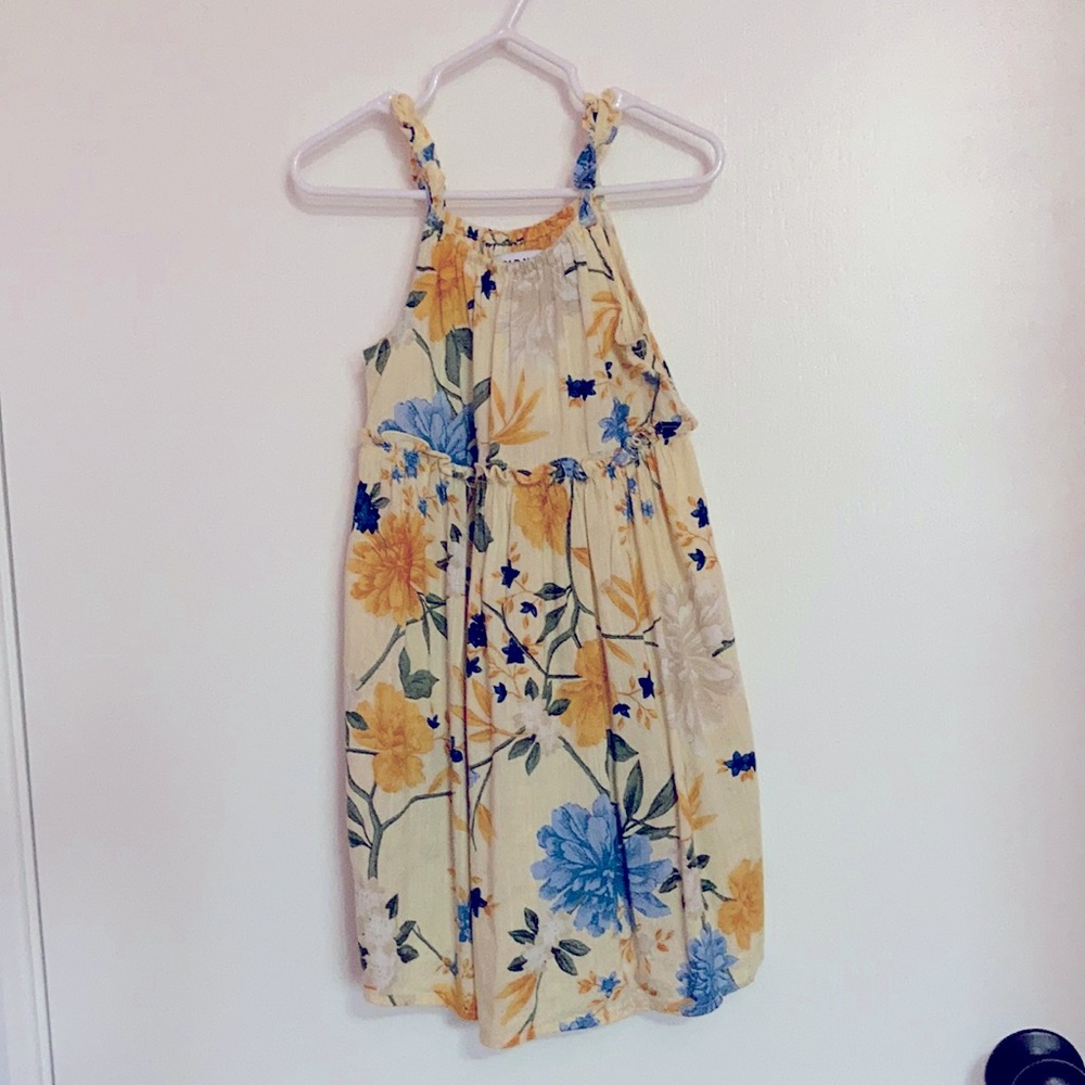 Toddler girl’s pale yellow floral sun dress